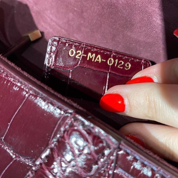 Metallic Burgundy Shiny Alligator Saddle Bag Gold
Hardware - Picture 2 of 11